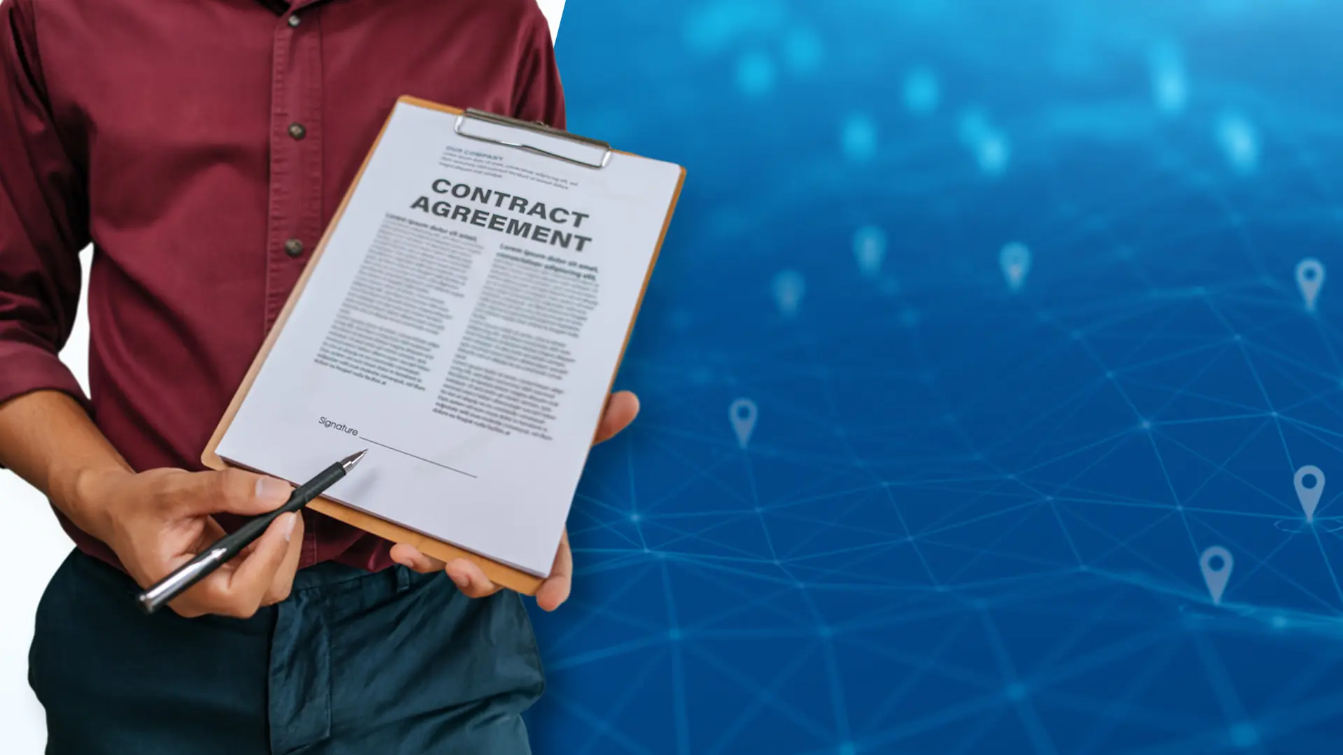 Person holding a contract agreement on a clipboard, representing fleet tracking pricing terms and contract structures