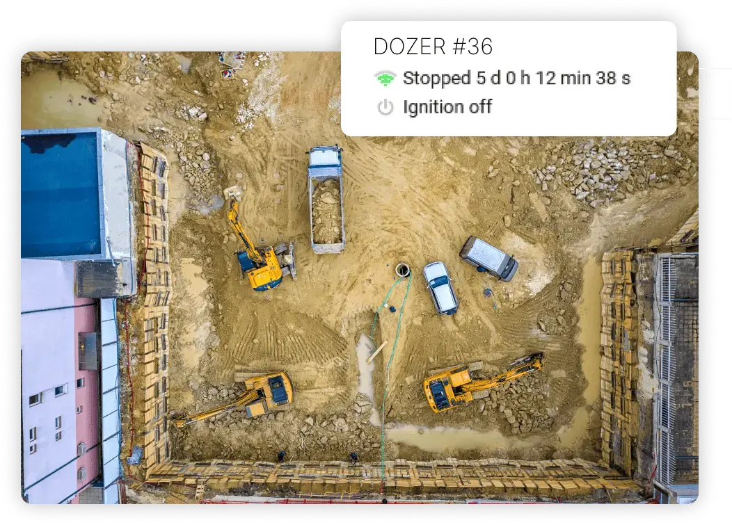 Aerial view of a construction site with equipment and a status overlay for a tracked dozer