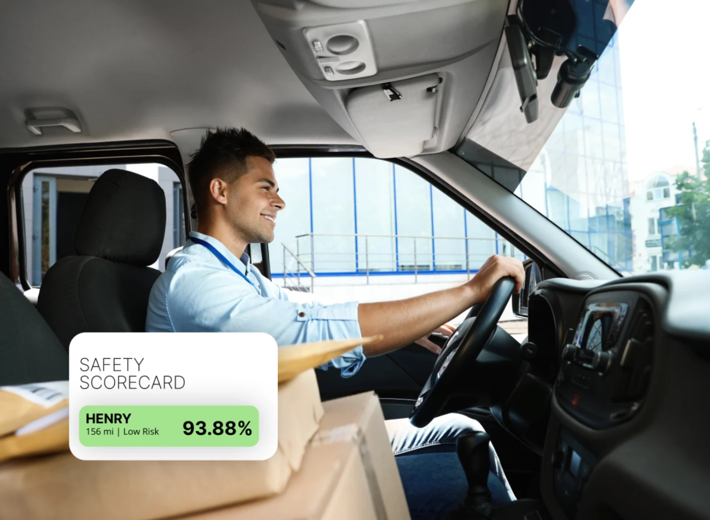 AI dashcam footage of a driver with a "Safety Scorecard — Henry, Low Risk, 93.88%" overlay, illustrating measurable behavior tracking.