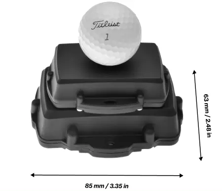 Golf ball on top of battery tracker to demonstrate the size