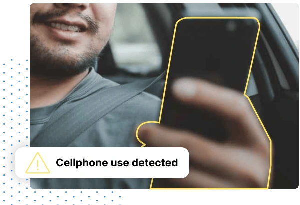 Person using cellphone in car