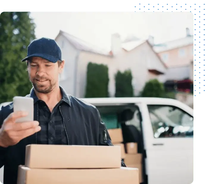 Delivery worker checking his phone