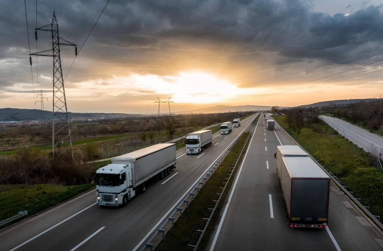 Trucks on highway with fleet tracking