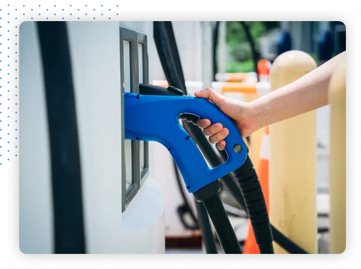 Hand on a fuel pump